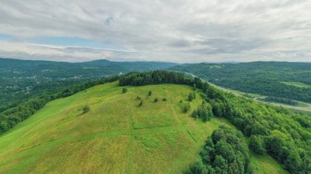 Aerial view of Observatory Knob in St Johnsbury Vermont showing grassy hill
