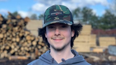 Vermont student and Land Stewards Award winner Caleb Steves in a lumber yard